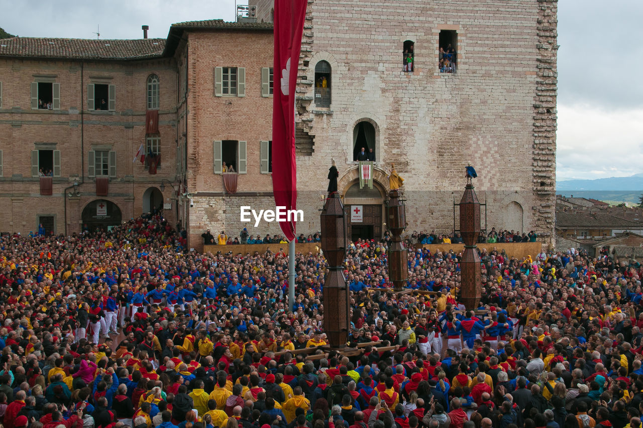 Large group of people in front of building