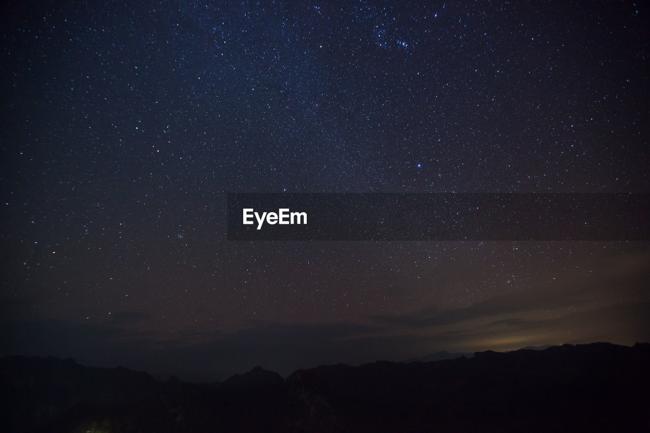 Low angle view of stars in sky at night