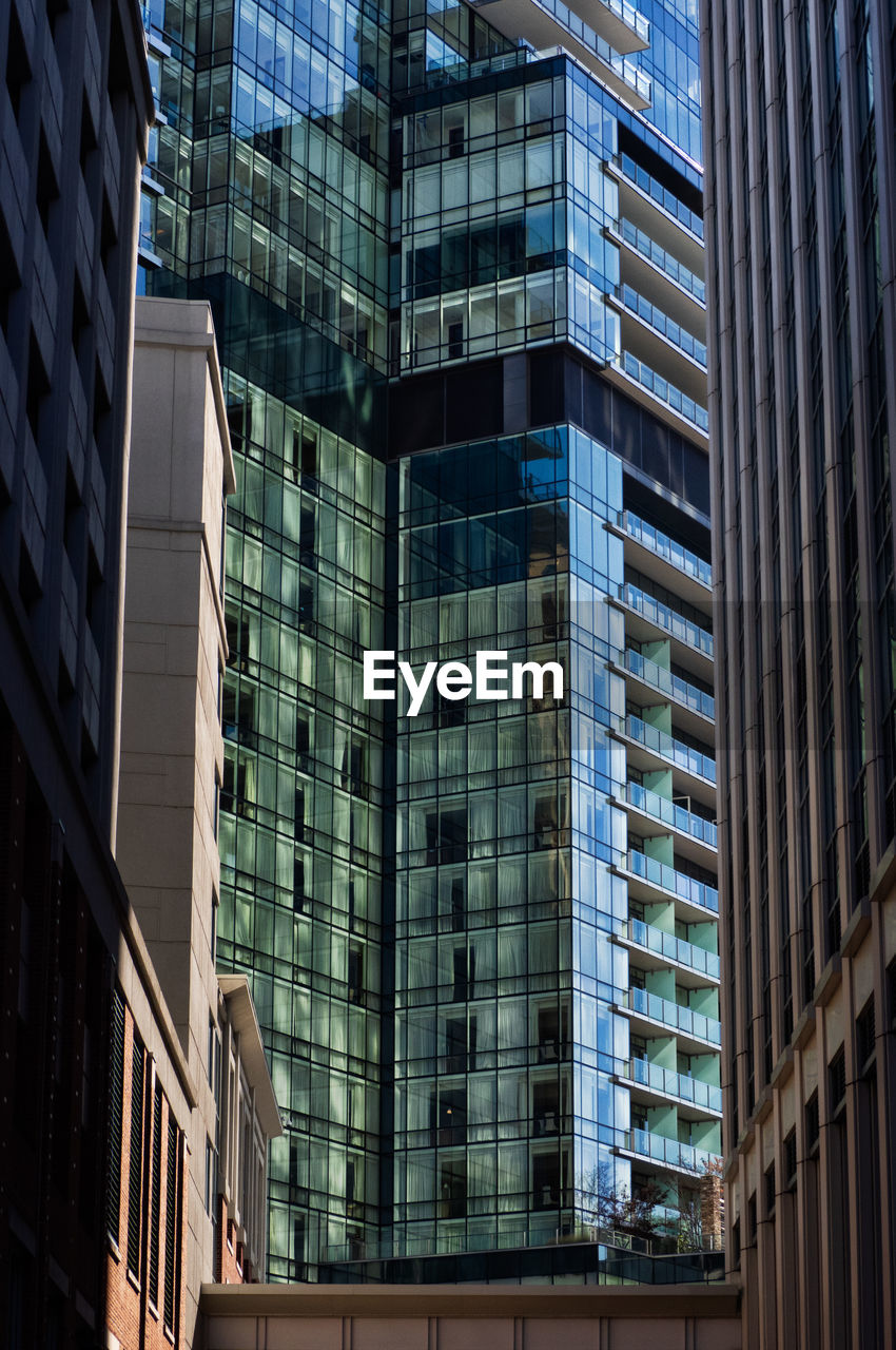 Low angle view of modern buildings in city