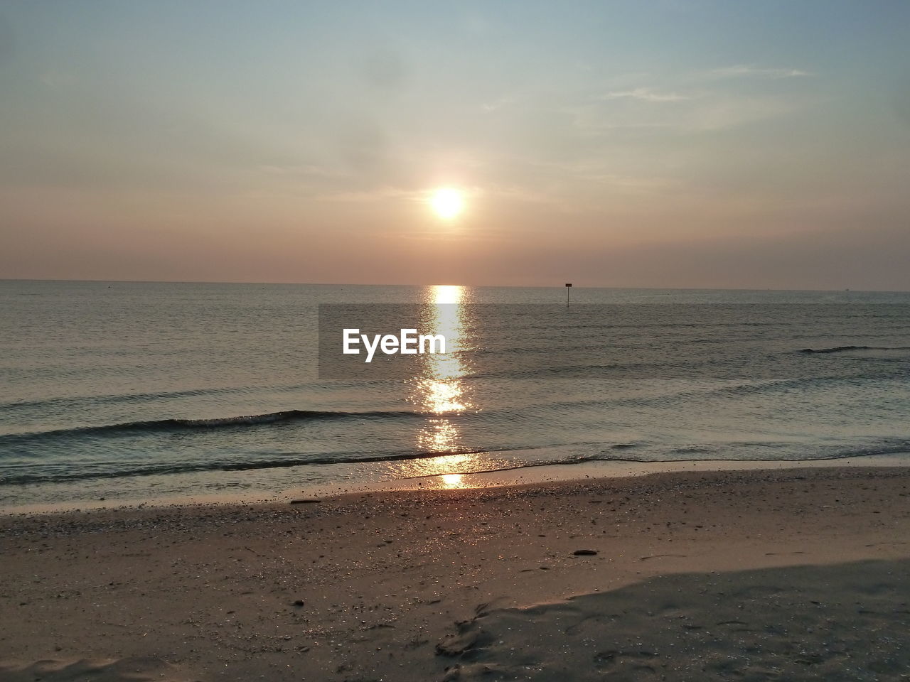 VIEW OF SEA AT SUNSET