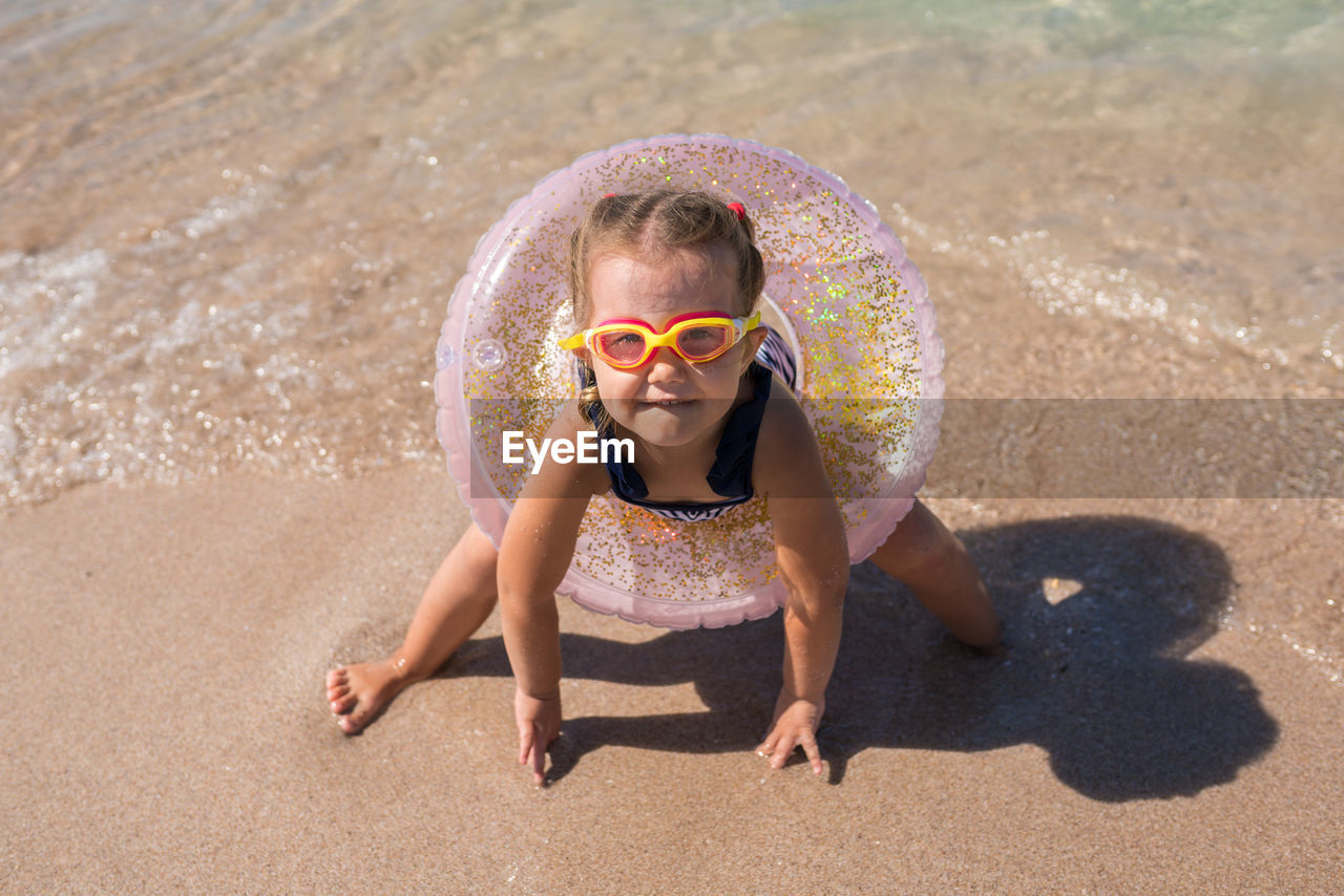 Girl playing at beach