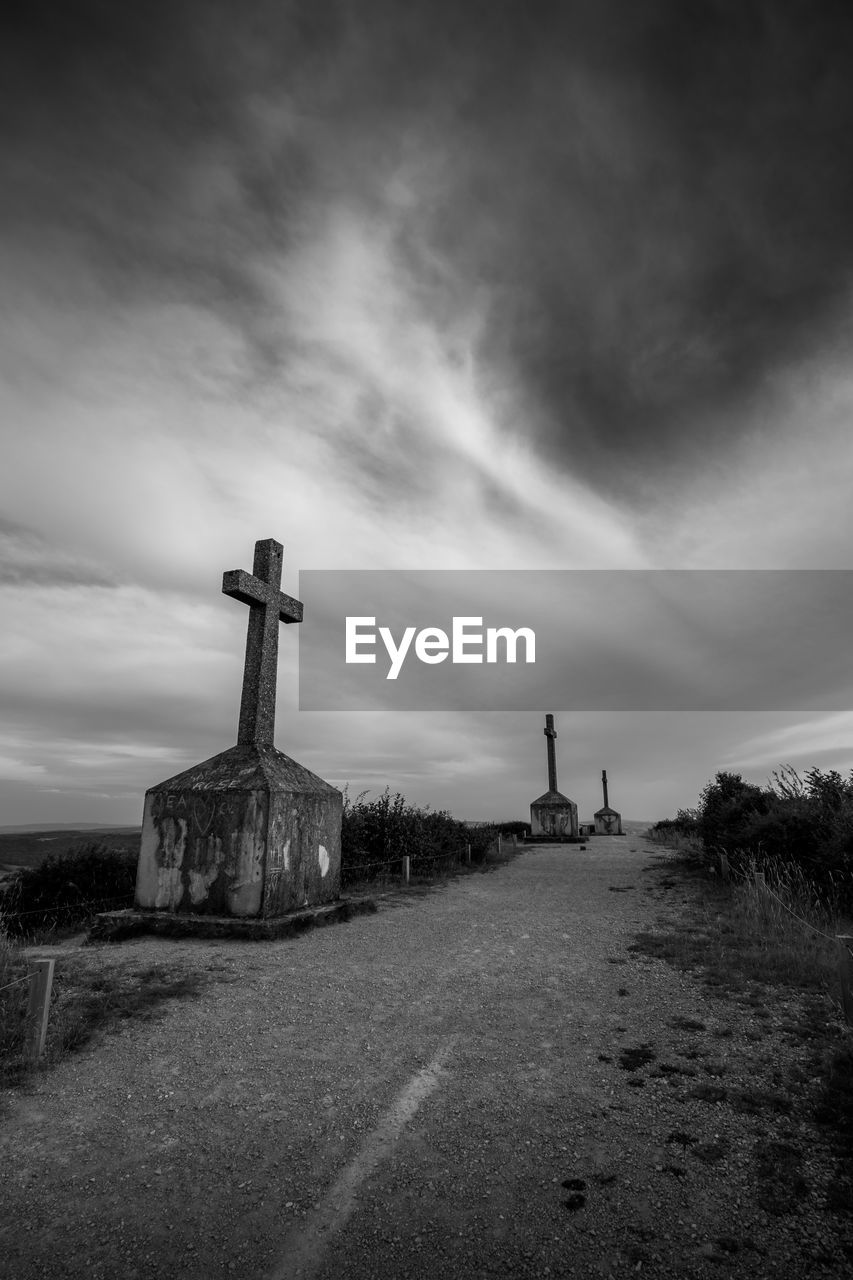 OLD CEMETERY AGAINST SKY