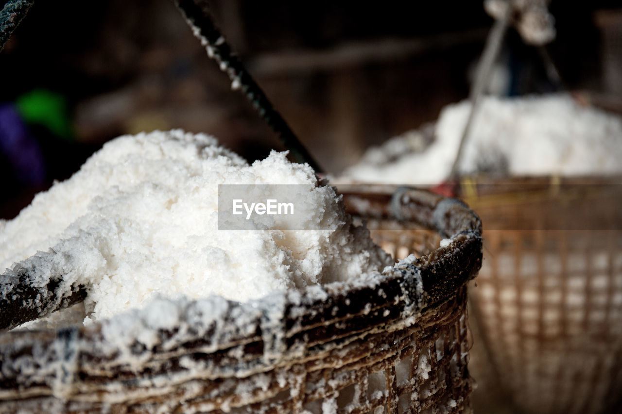 CLOSE-UP OF ICE CREAM ON WOODEN FLOOR