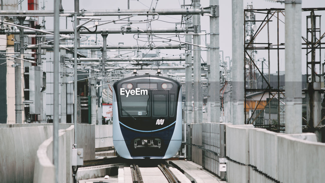 TRAIN AT RAILROAD STATION