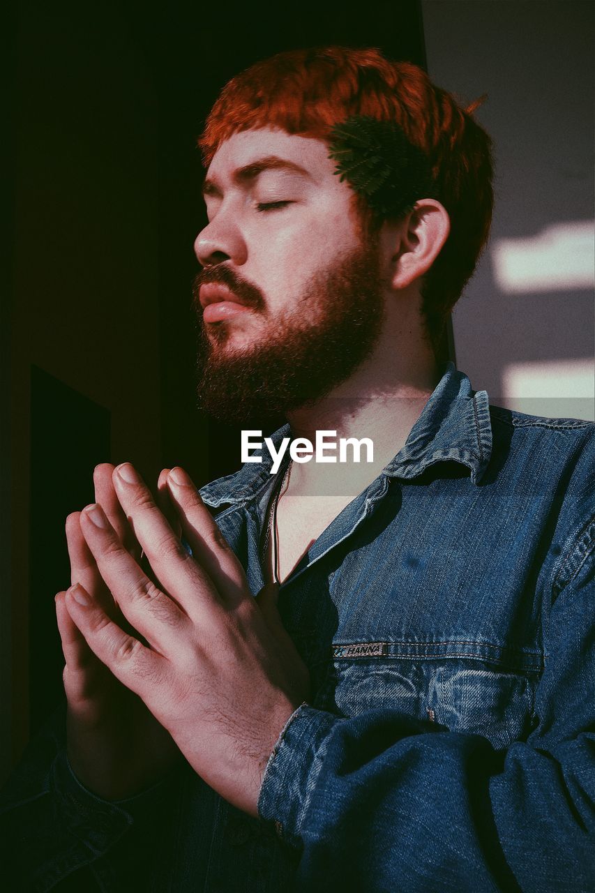 Young man praying