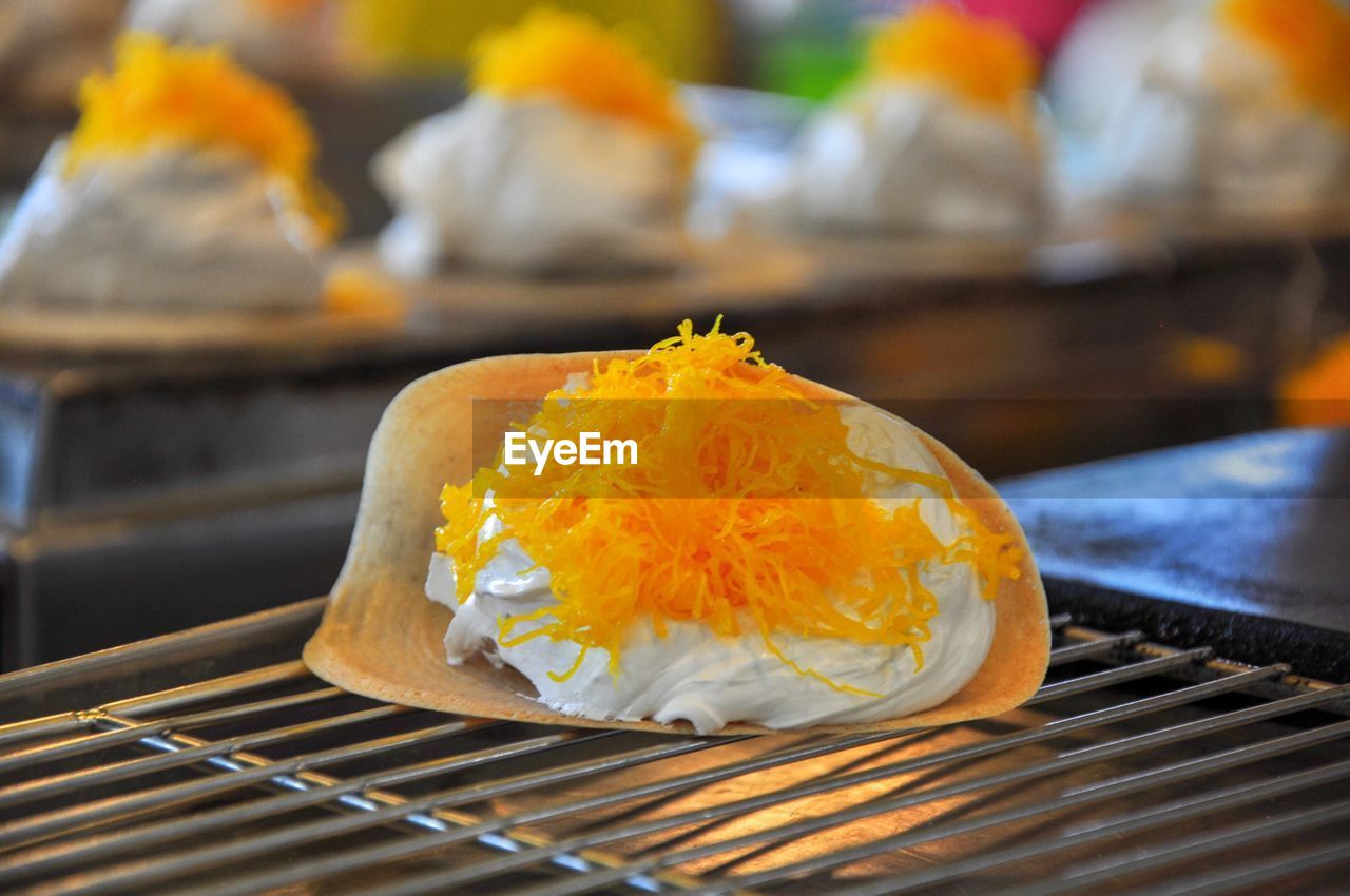 Close-up of food on metal grate