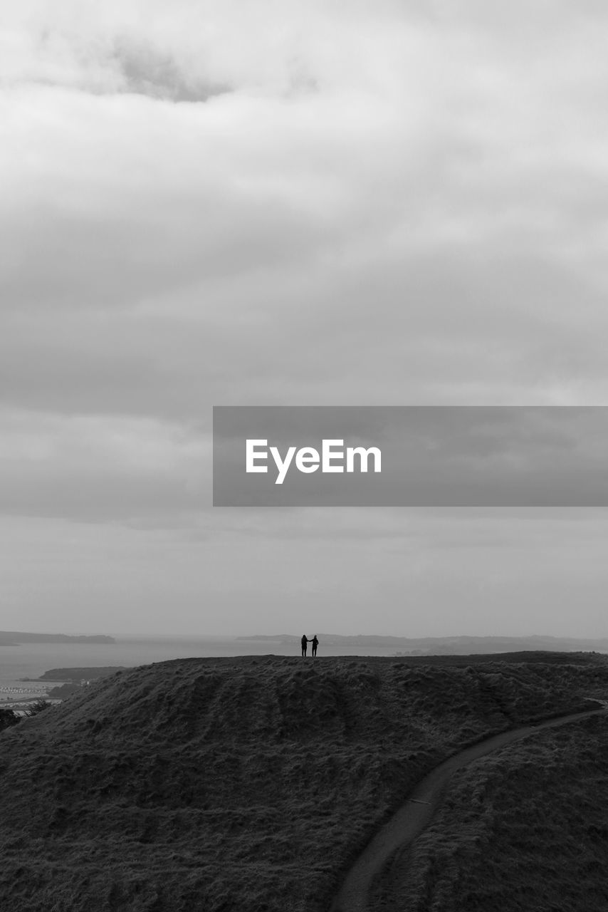 VIEW OF SEA AGAINST CLOUDY SKY