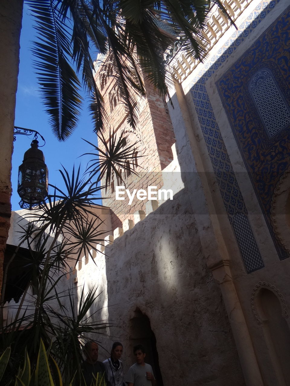 LOW ANGLE VIEW OF BUILDINGS AGAINST THE SKY