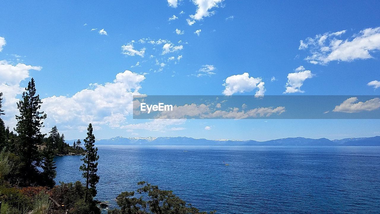 Scenic view of sea against blue sky