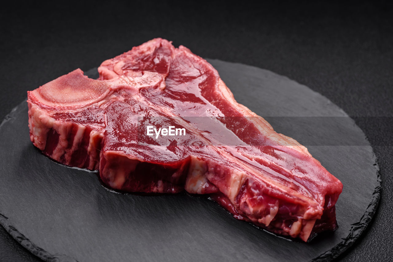 meat, red meat, food and drink, food, beef, freshness, kobe beef, steak, indoors, raw food, flesh, black background, dish, no people, red, studio shot, protein, goat meat, veal, still life, close-up