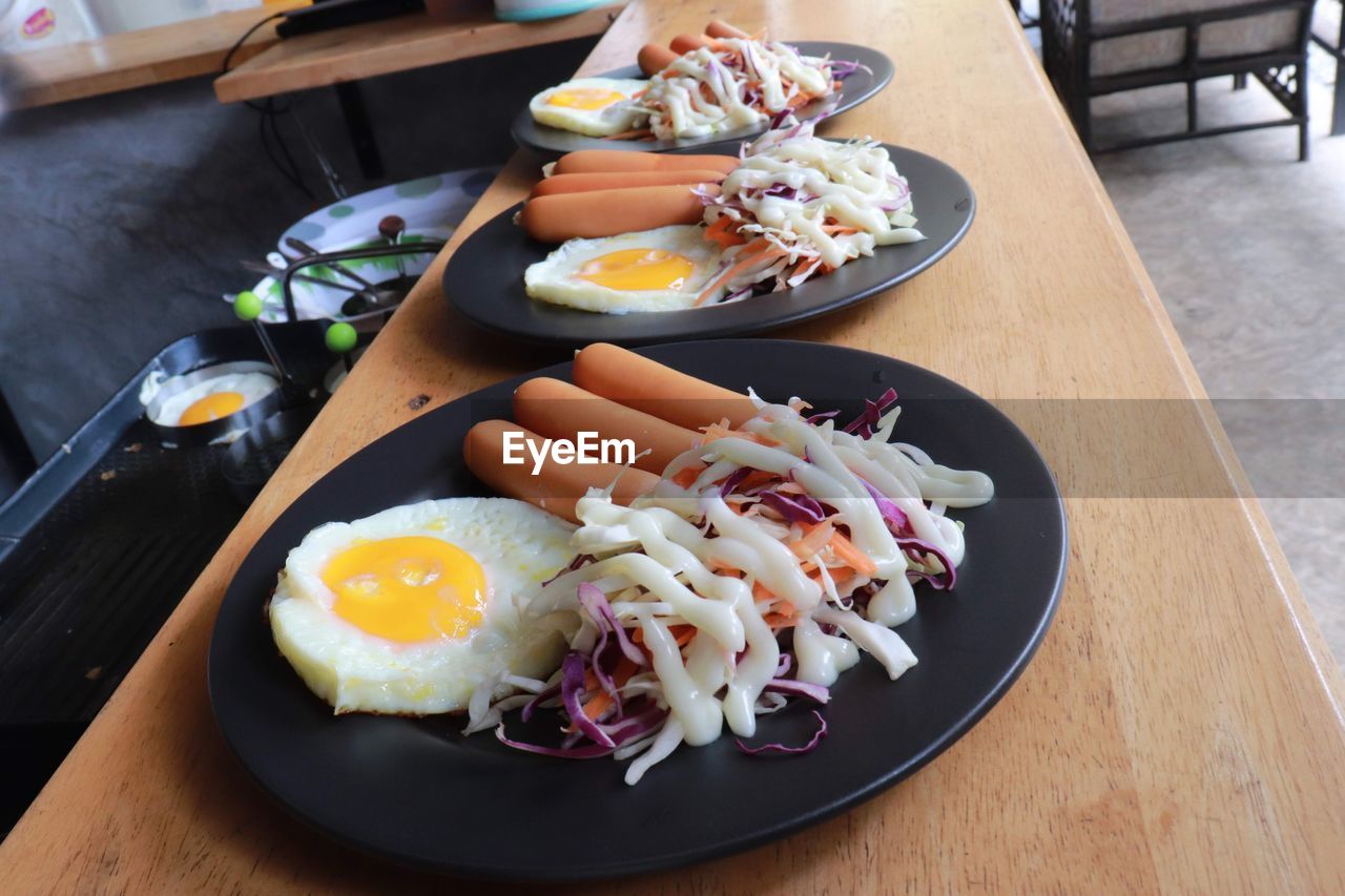 High angle view of breakfast served on table