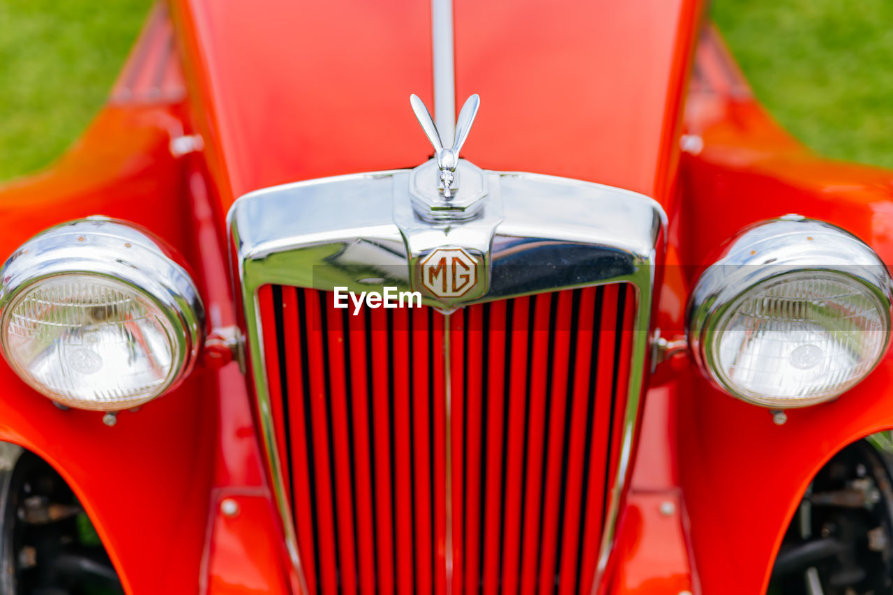 CLOSE-UP OF RED CAR