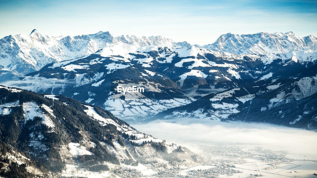 Scenic view of snowcapped mountains against sky