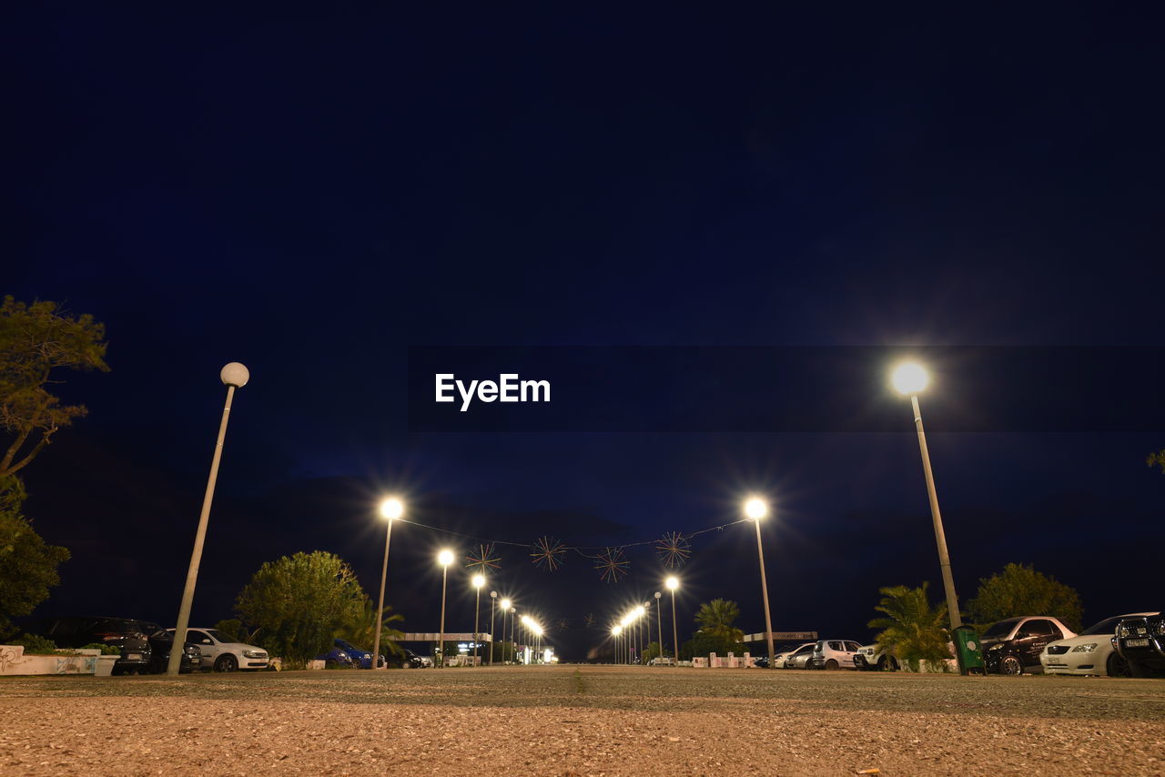 ILLUMINATED STREET AT NIGHT