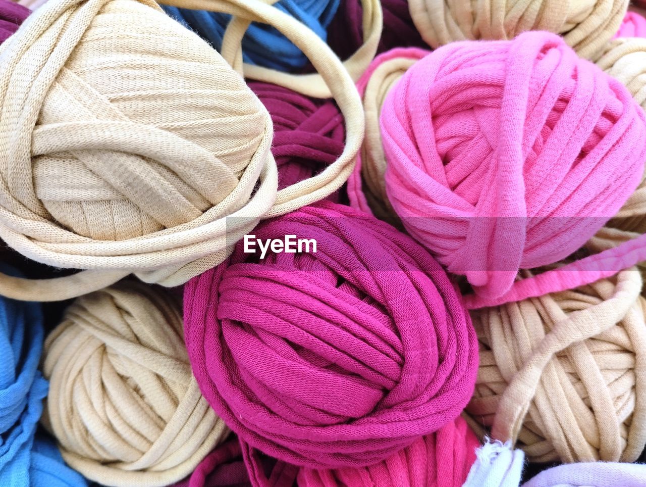 thread, textile, pink, multi colored, large group of objects, no people, still life, close-up, variation, ball of wool, material, purple, full frame, wool, abundance, backgrounds, market, retail, for sale, indoors, craft, high angle view