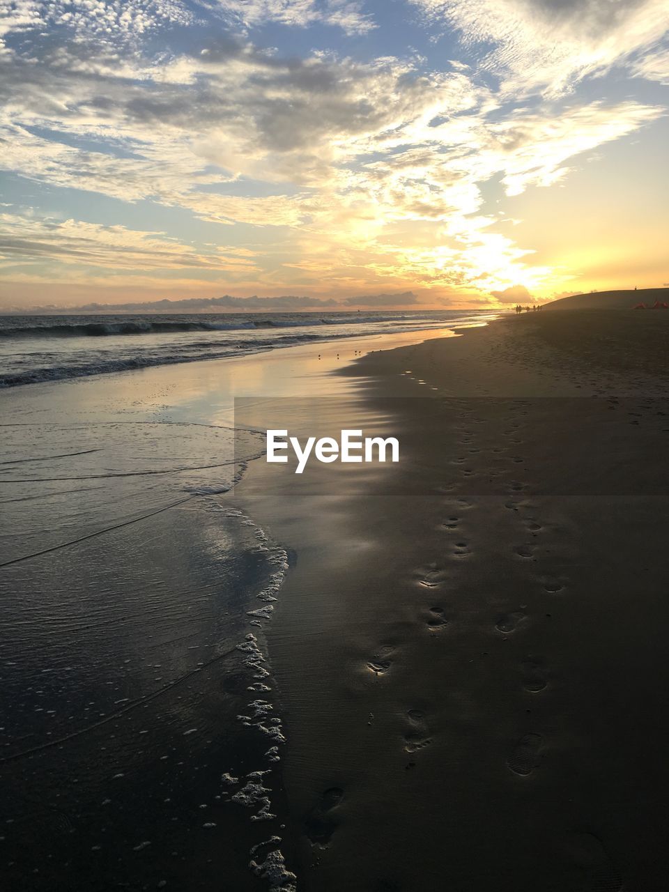 Scenic view of sea against dramatic sky