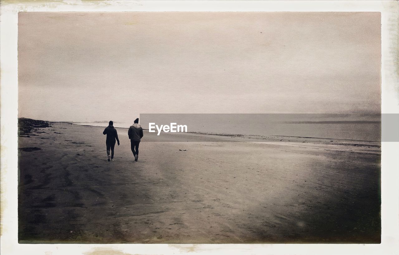 Couple walking on beach