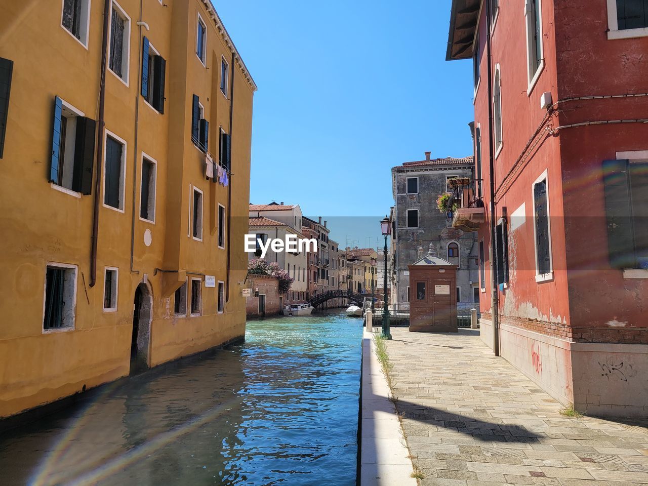 street amidst buildings in city