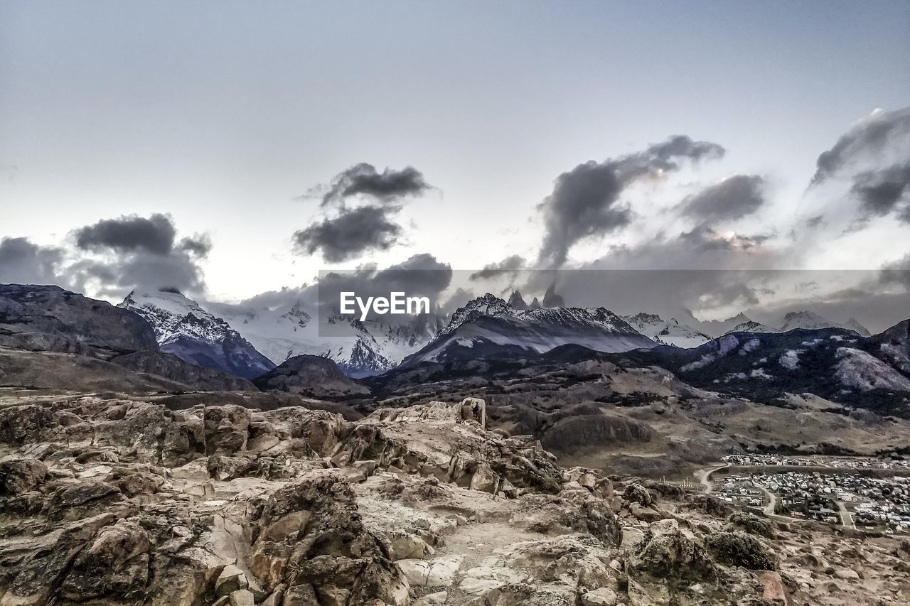 Scenic view of snowcapped mountains against sky