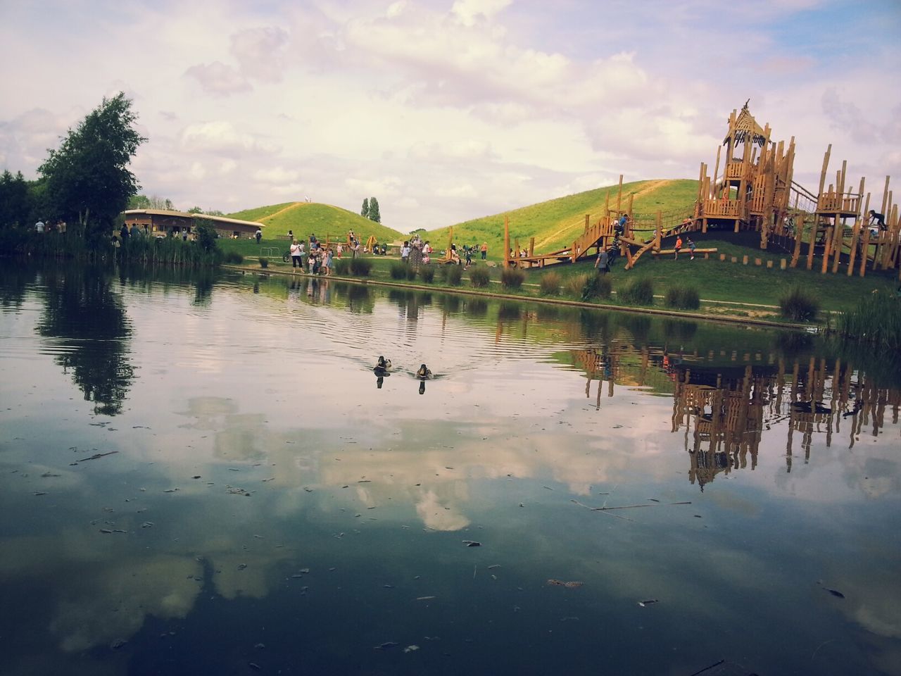 REFLECTION OF BUILDING IN LAKE