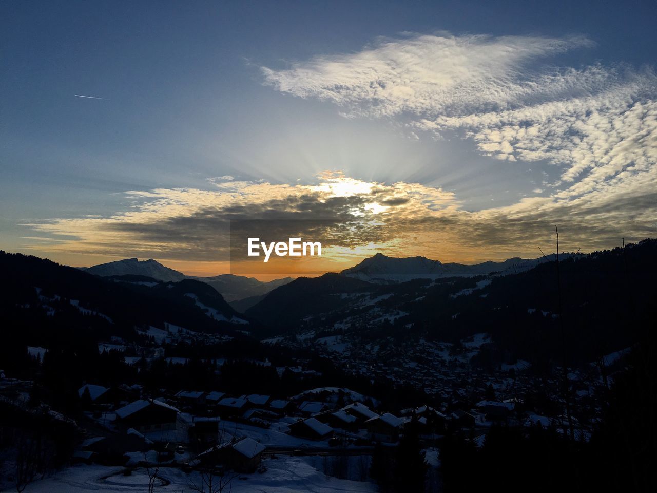 SCENIC VIEW OF MOUNTAINS AGAINST SKY DURING WINTER