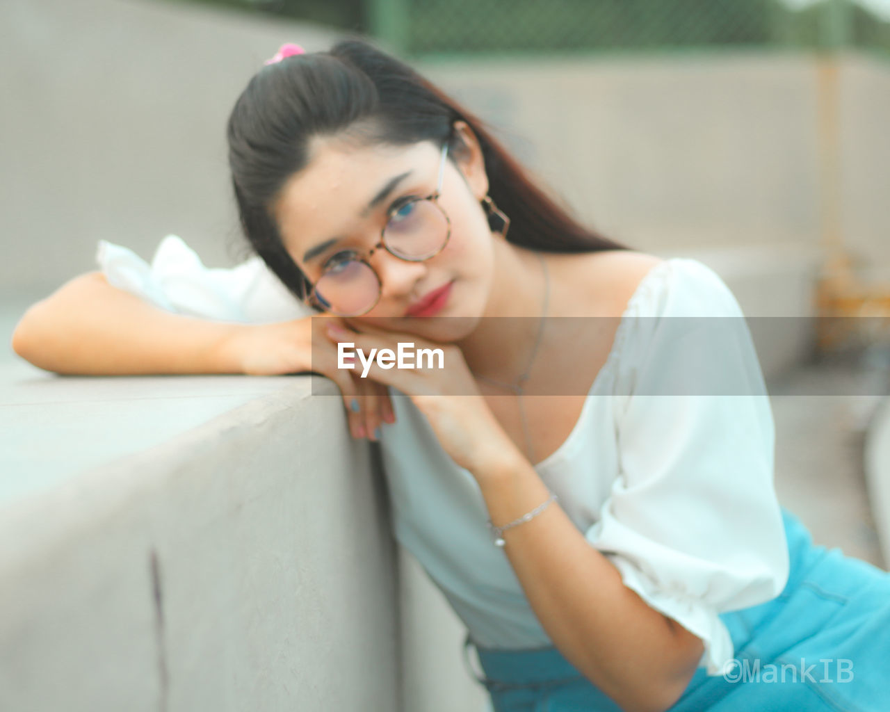 PORTRAIT OF A YOUNG WOMAN WITH EYES CLOSED