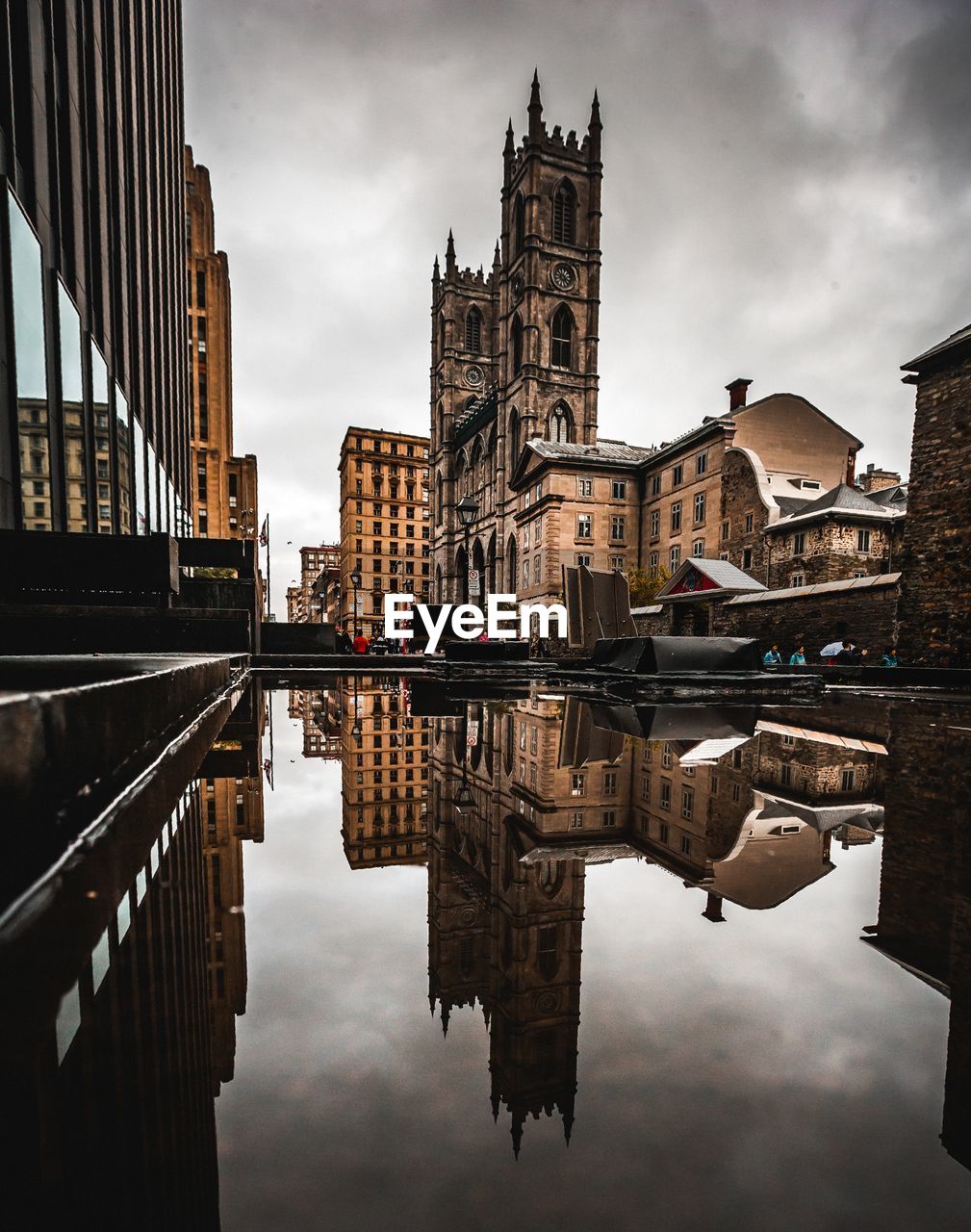 REFLECTION OF CATHEDRAL IN PUDDLE