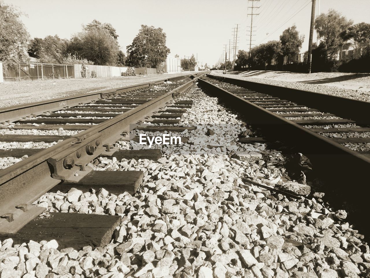 RAILROAD TRACKS AGAINST SKY