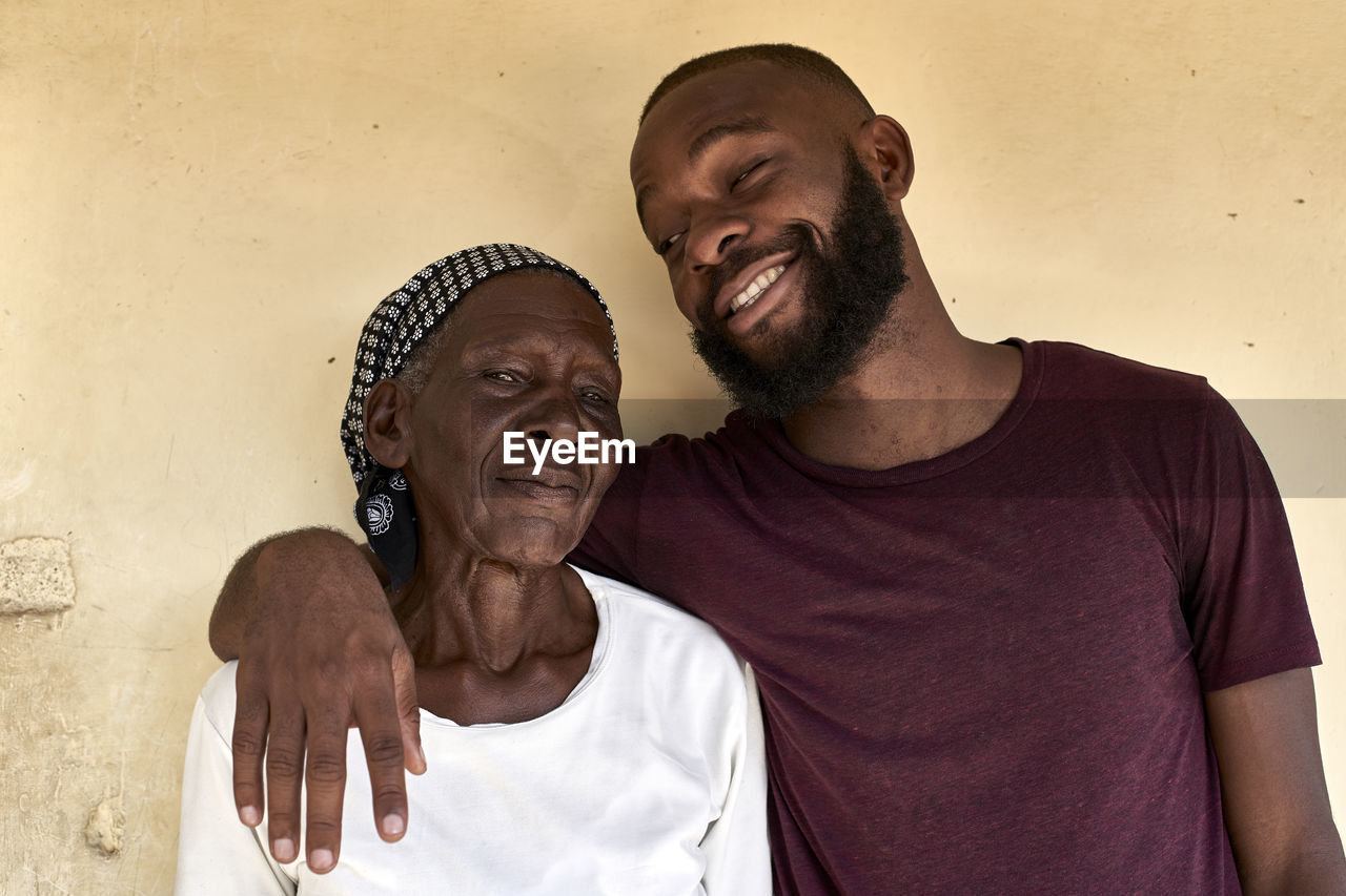 Mozambique, maputo, portrait of grandmother and grandson