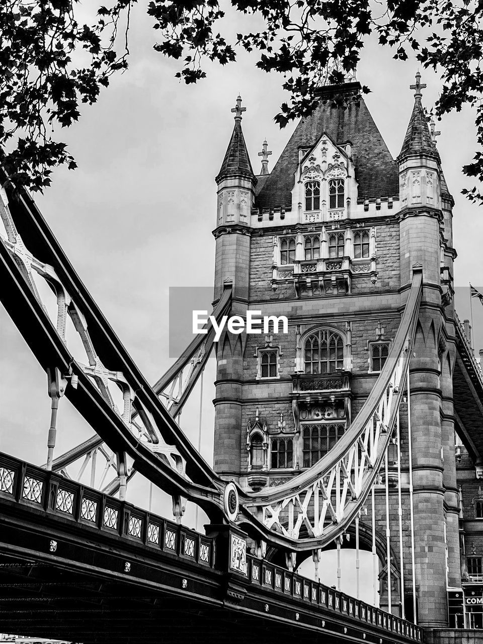 architecture, built structure, black and white, bridge, building exterior, travel destinations, monochrome photography, monochrome, city, sky, landmark, nature, travel, tourism, tower, transportation, building, no people, low angle view, the past, day, history, outdoors, cityscape, tree, cloud