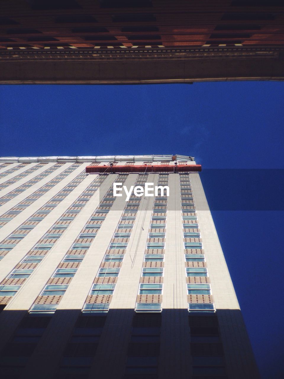 LOW ANGLE VIEW OF MODERN BUILDINGS