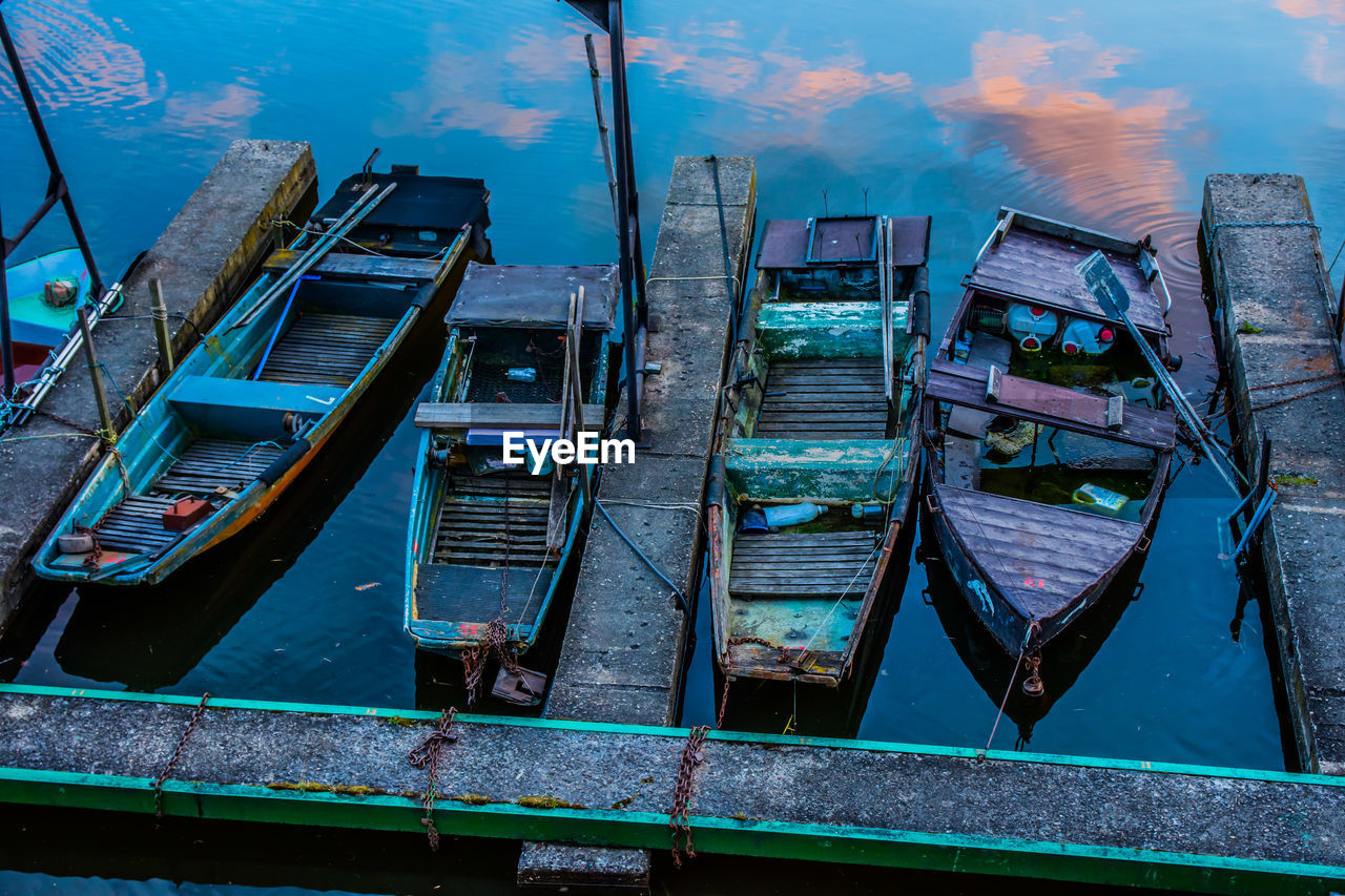 High angle view of boats moored in water