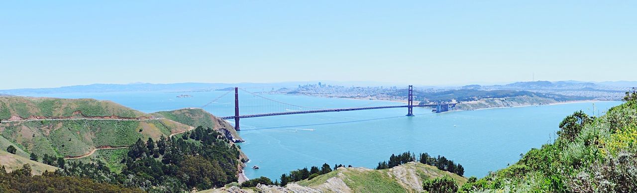 Panoramic view of golden gate bridge over san francisco bay against clear sky