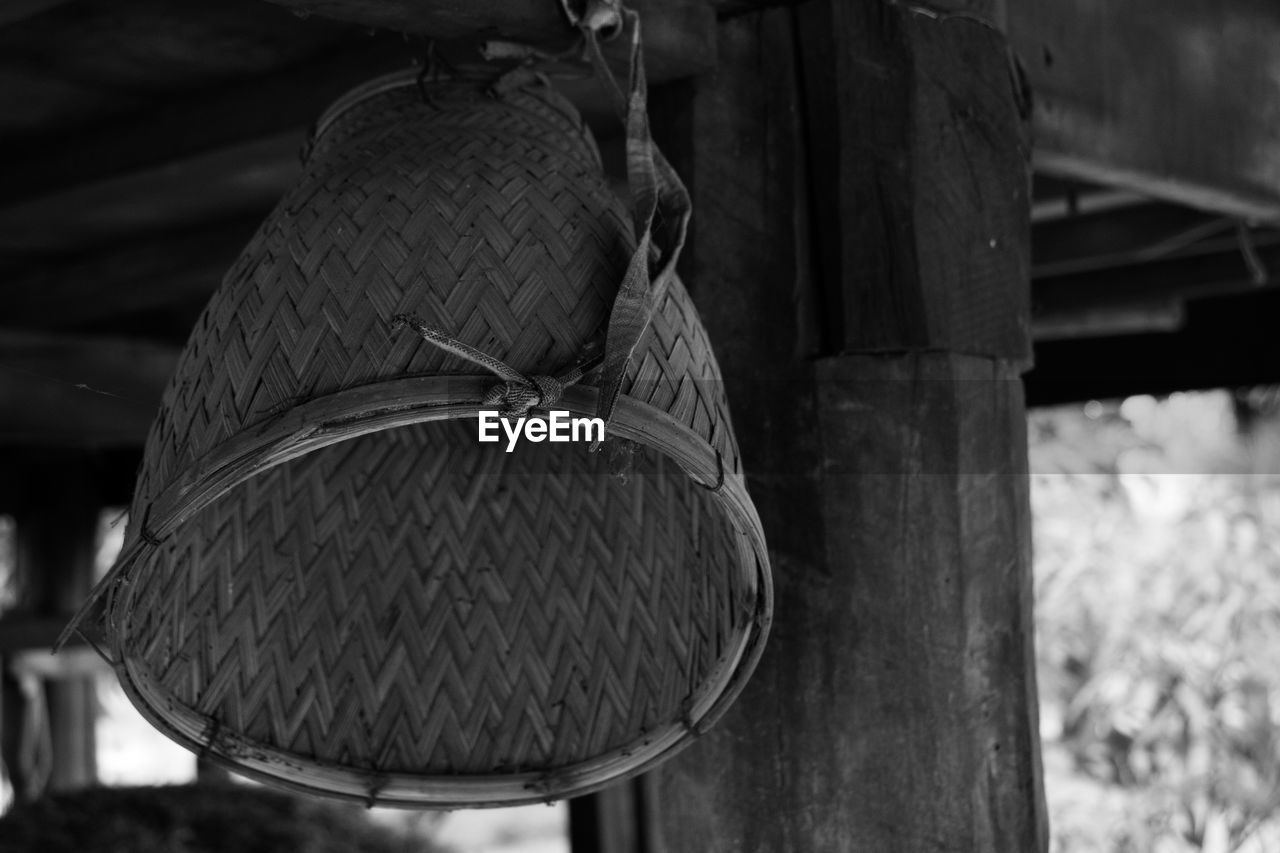 Close-up of rope tied to wooden post