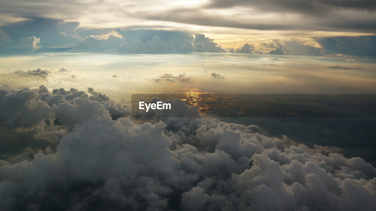 Aerial view of clouds in sky during sunset