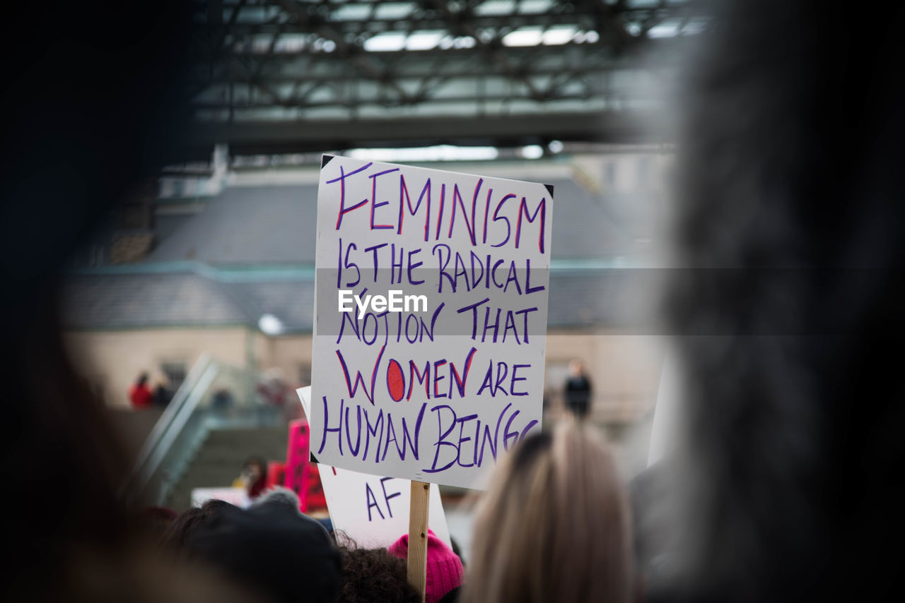 Feminist sign being held up in women's march. 