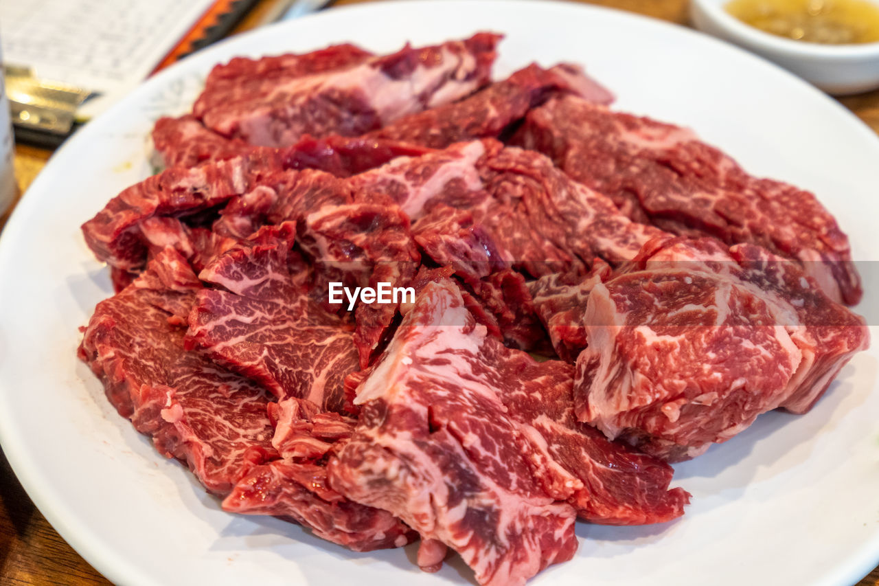 Close-up of meat in plate on table