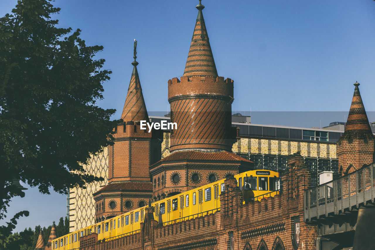 Low angle view of historic buildings against clear sky