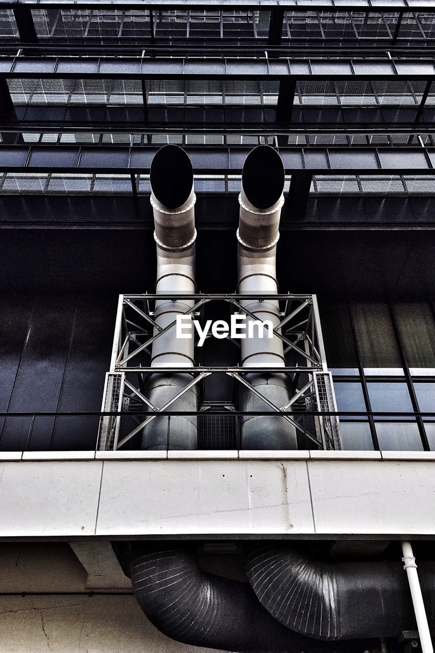 LOW ANGLE VIEW OF MODERN BUILDINGS
