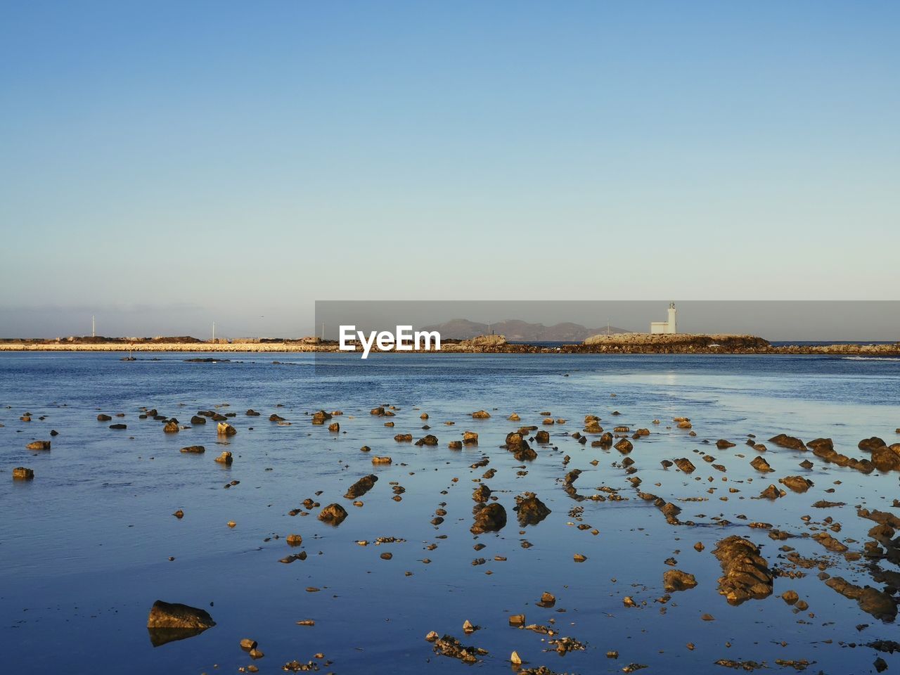 Scenic view of sea against clear sky