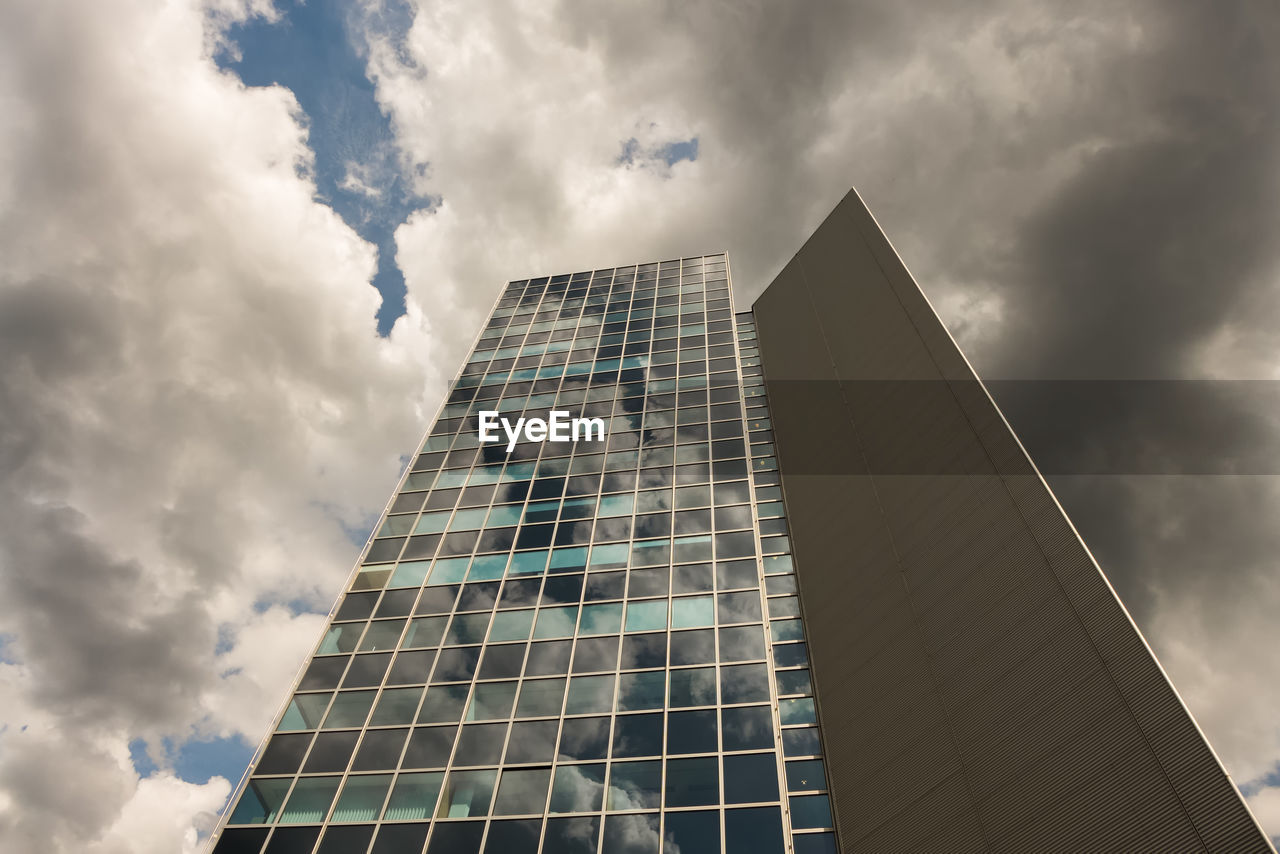 Low angle view of modern building against sky