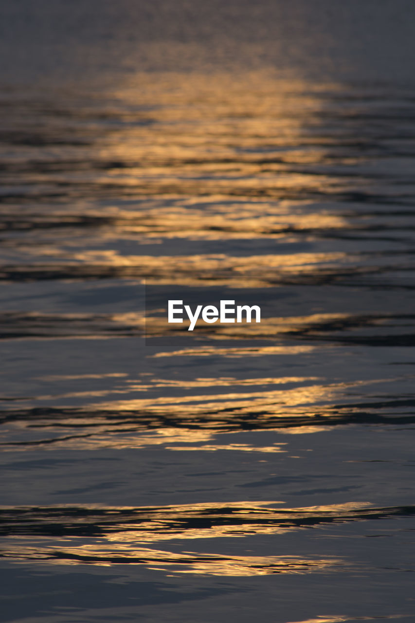 Scenic view of sea against sky at sunset