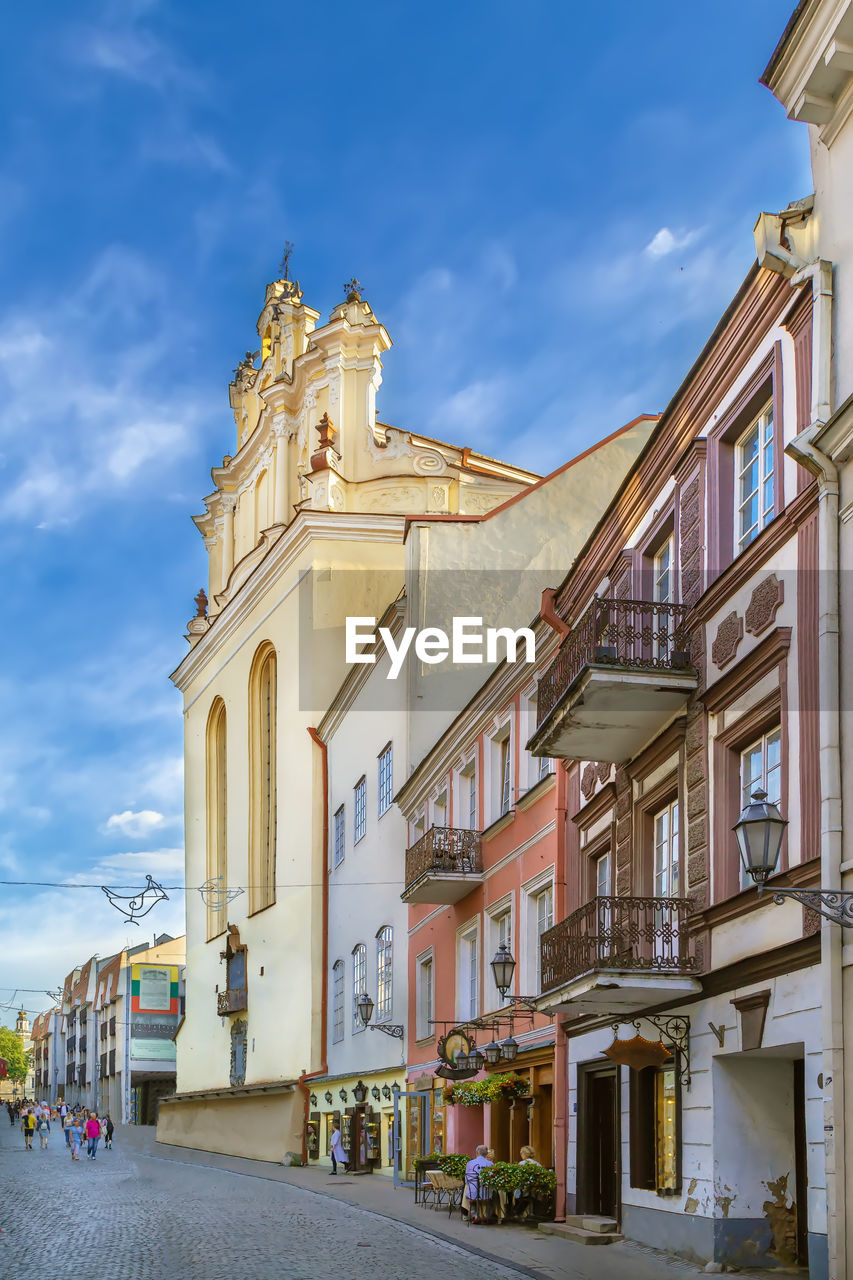 Piles street with st. john church in vilnius, lithuania