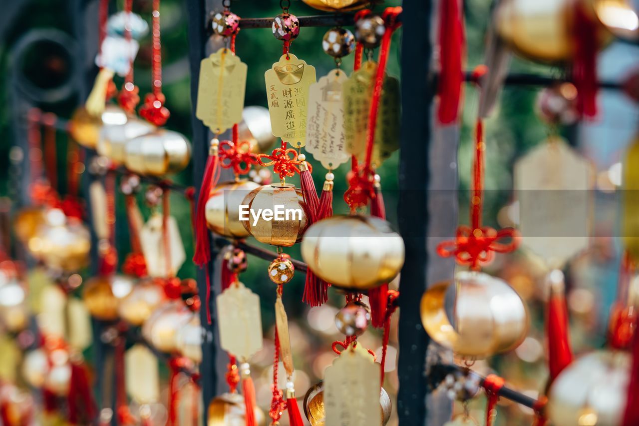 Close-up of decoration hanging for sale in market