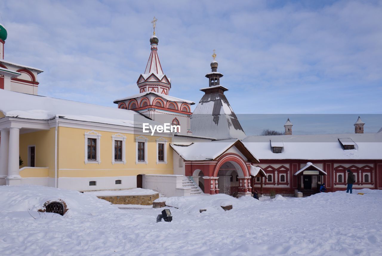 BUILDING AGAINST SKY DURING WINTER