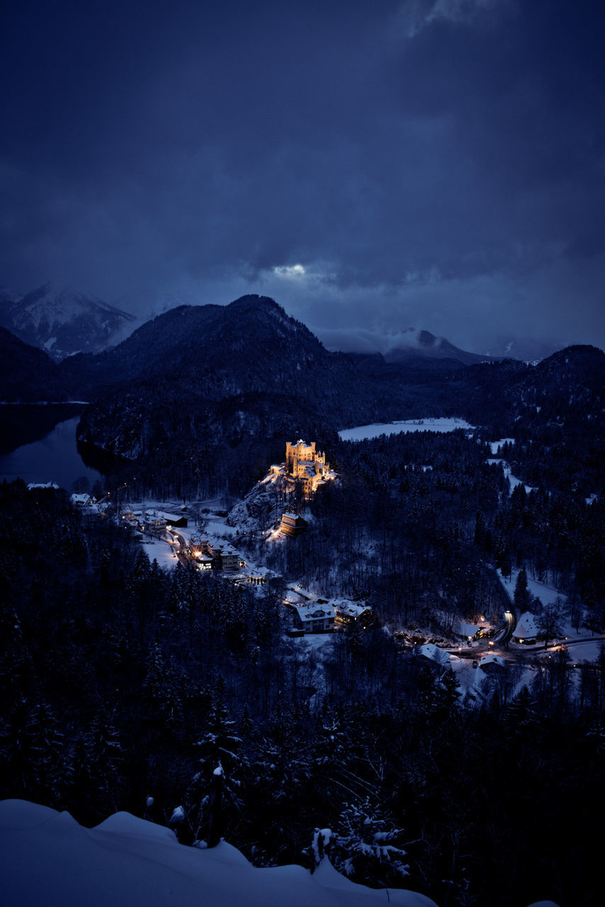 Scenic view of mountains against sky during winter