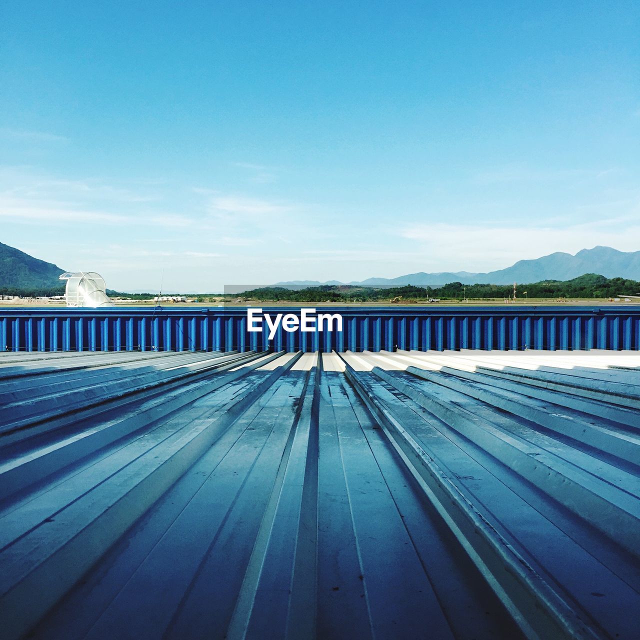 Roof at airport against sky