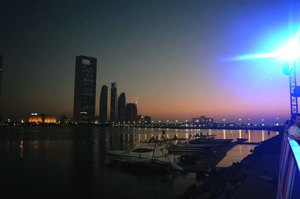 VIEW OF ILLUMINATED BUILDINGS AT NIGHT