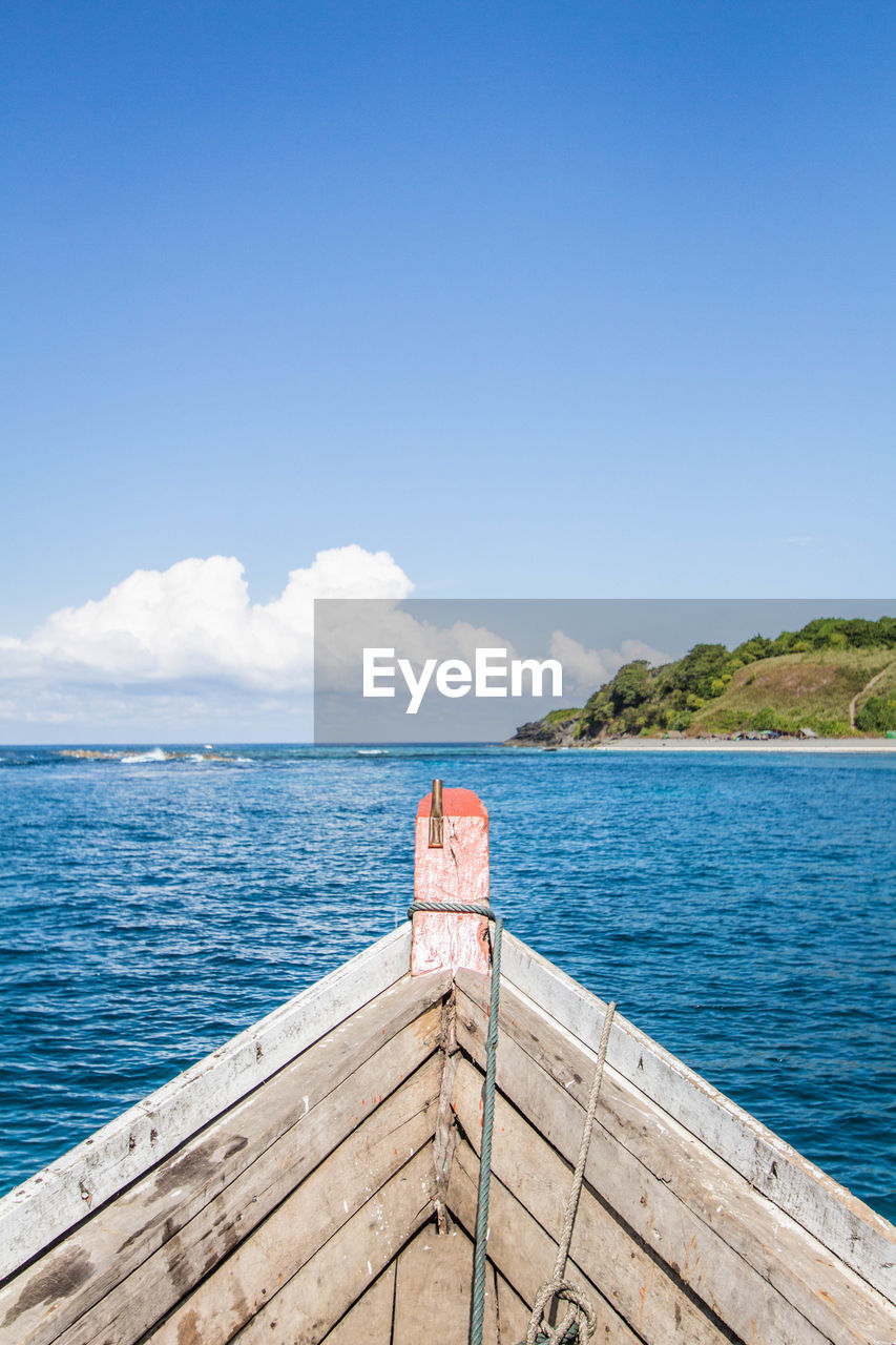 Scenic view of sea against blue sky