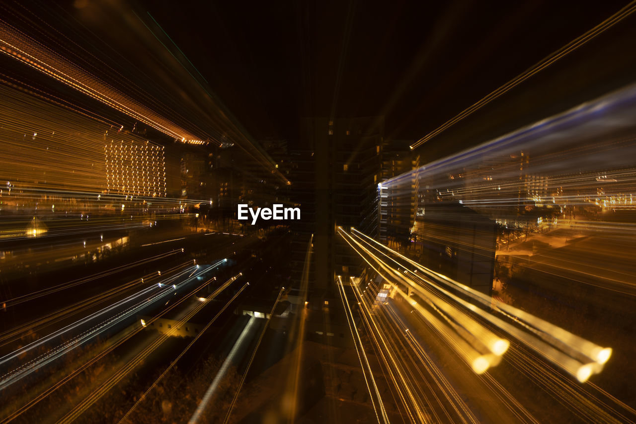 High angle view of light trails at night